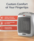 Compact Desktop Ceramic Space Heater With Adjustable Thermostat, Two Heat Settings And Fan Only Mode, silver heater on wood surface.