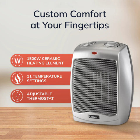 Compact Desktop Ceramic Space Heater With Adjustable Thermostat, Two Heat Settings And Fan Only Mode, silver heater on wood surface.