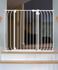 Multi-Use Extra Tall Walk Through Baby Gate In Metal White Finish, 36 Inch Tall, installed on stairway with wooden handrails