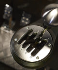 Next Level All Metal H Pattern And Sequential Sim Racing Shifter With Real Hall Effect Sensors For Plug And Play Setup And Ridiculously Smooth Shifts On Ps5 Xbox Pc close-up of gear lever and chrome panel