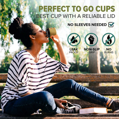 Woman drinking from Premium 4 Oz Insulated Triple Wall Ripple Paper Coffee Cups With Black Lids 50 Pack on a park bench.