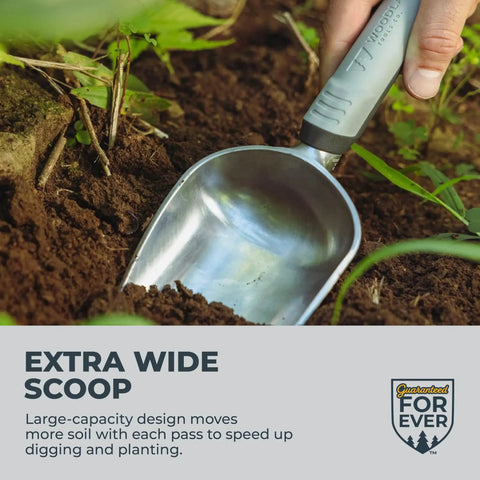 Beefy Aluminum Garden Trowel With Full Tang Extra Wide Scoop Sharpened Point being used in soil, ergonomic cushioned grip visible.