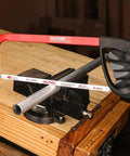 12 Inch Hacksaw With High Tension Frame And 24 TPI Bi Metal HSS Blade For Cutting Metal Steel Pipe PVC And Wood Hand Saw HT0398 Beefy For Metalworking, Carpentry, And DIY Projects; Built Tough For Consistent, Straight Cuts in use cutting metal pipe on workbench.