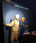 Two workers in hard hats illuminated by Boss Level Ultra Bright 2000 Lumen Magnetic Gooseneck Work Light during nighttime job site work.