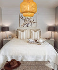 Cozy bedroom with Plug In Pendant Light With Handmade Bamboo Lampshade Boho Rustic Chandelier Dimmer Switch above bed.