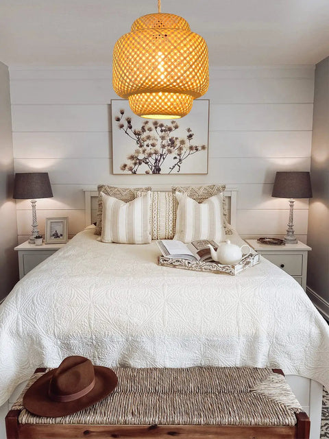 Cozy bedroom with Plug In Pendant Light With Handmade Bamboo Lampshade Boho Rustic Chandelier Dimmer Switch above bed.