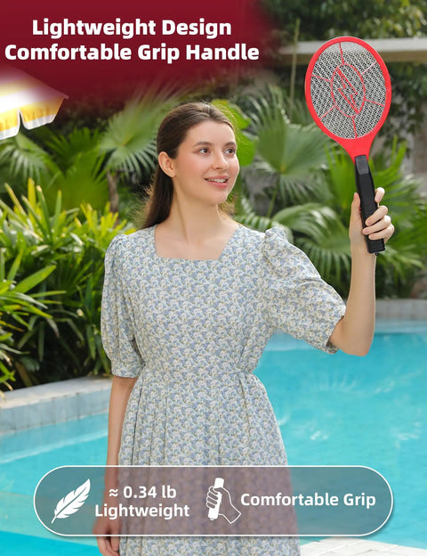 Woman holding red 2 Pack Electric Fly Zapper Rackets Handheld Bug Swatters Red And Blue Battery Powered For Mosquitoes And Flies