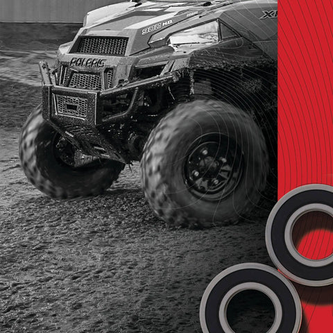 Close-up of off-road vehicle and wheel bearings; Wheel Bearing Kit For Harley And Kawasaki With 2 Ball Bearings, Double Lip TC Seals