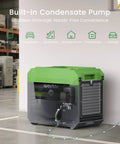 Industrial Grade 150 Pint Commercial Dehumidifier With Built In Pump And Drain Hose in a warehouse setting.