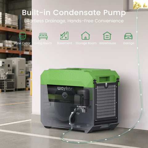 Industrial Grade 150 Pint Commercial Dehumidifier With Built In Pump And Drain Hose in a warehouse setting.