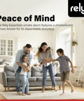 Family in living room with Battery Operated Smoke Alarm With Photoelectric Sensor, Compact 4 Inch Smoke Detector visible