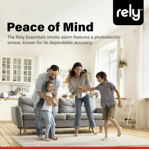 Family in living room with Battery Operated Smoke Alarm With Photoelectric Sensor, Compact 4 Inch Smoke Detector visible