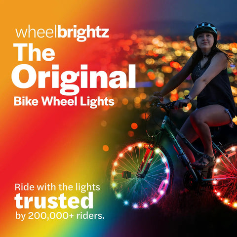 Cyclist at night with RGB LED Bike Wheel Lights For Night Rides 1 Pack Lit Kid Safe Glow For Wheels And Spokes Fun Bike Accessory.