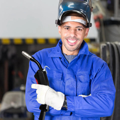 Solid 14k Copper Mig Welding Torch Stinger With Operating Channels That Fits All Standard Wire Sizes, held by a smiling welder.