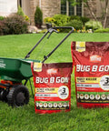 Lawn spreader and two bags of All In One Lawn Insect Killer That Kills Ants Fleas Ticks Chinch Bugs Mole Crickets on grass