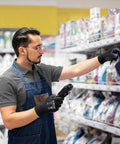 Man wearing Lightweight Seamless Knit PU Coated Work Gloves For Men And Women With Smooth Palm Grip 13 Gauge Polyester