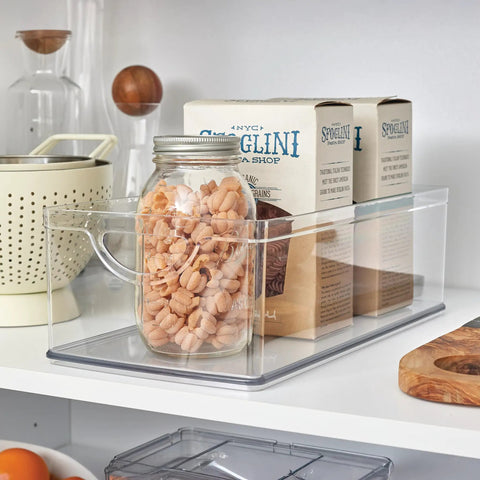 No Sweat Big League Heavy Duty Clear Stackable Extra Long Plastic Storage Bin For Nifty Pantry Setup with snacks in jar.