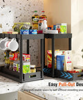 Heavy Duty Pull Out Under Sink Organizer Drawers Set Of Two Black Gliding Kitchen Cabinet Storage Carts with various bottles and mugs.
