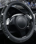 Fresh Bling Diamond Leather Steering Wheel Cover Loaded With Sparkly Crystal Rhinestones Universal Fit For Rides Trucks And SUVs Premium Comfort Grip Accessory For Women in a car interior showing the grip details.