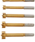 Pro Shop Tier Titanium Forstner Bit Set Delivers Kick Ass Sharpness For Zero Snag Wood Drilling seven titanium hole cutters arranged.