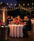 Gas Patio Heater With Wheels, Floor Standing Outdoor Heater With Round Dancing Flame And Glass Tube next to dinner table on veranda