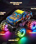 Monster Truck RC Car For Kids 1 To 20 Scale 2.4GHz All Terrain Toy With Lights Rechargeable Batteries Realistic Details Indoor Outdoor Off Road Ready Gift For Boys Girls Toddlers featuring colorful graffiti, PVC body, and LED wheels