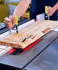 Person using Matchfit Dovetail Clamps Four Pack Exclusive Bundle With Dovetail Router Bit One Quarter Inch Shank on a wood board