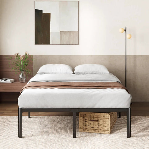 Heavy Duty Steel Platform Bed For Full Size Mattresses with clean gray bedding and a wooden nightstand in modern decor.