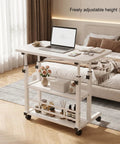 Height Adjustable Standing Desk With Rock Solid Swivel Casters And Sturdy Mobile Computer Workstation beside bed for easy access.