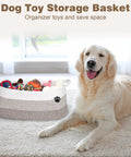 Large Dog Toy Storage Basket Rope Bin 30L For Toys And Blankets Pet Gear White And Brown 19.7 X 11 X 7.9 Inches next to a dog