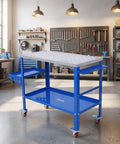 Heavy Duty Steel Welding Table With Adjustable Height And Three Angle Tilting Featuring Lockable Caster Wheels Tool Storage Trays And Built Tough Frames For Hardcore Shop Fabrication in a workshop.