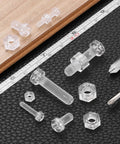 Clear Acrylic Screws Kit 10 Piece Set M4 X 18mm Round Head Phillips Bolts With Hex Nuts on black surface with ruler and screwdriver