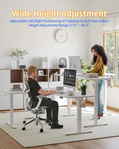 Spacious YIHAYO L Shaped Standing Desk Adjustable Height Electric Corner Computer Desk With Splice Board For Home Office White in use with height adjustments.