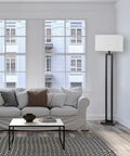 58 Inch Floor Lamp In Matte Black Finish With White Linen Rectangular Shade, Modern Geometric Cutout Design, E26 Base in living room