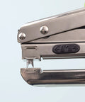 Side view of Crop-A-Dile Power Punch for one quarter inch holes scrapbooking tool showing punch mechanism close-up