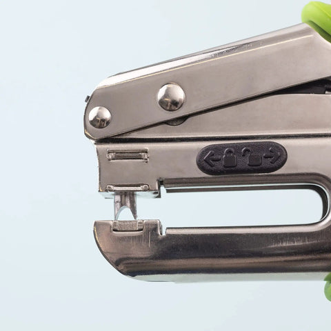 Side view of Crop-A-Dile Power Punch for one quarter inch holes scrapbooking tool showing punch mechanism close-up