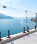 Six Panel Ready To Roll Glass Deck Railing Kit With No Stress Install And Built Tough Laminated Safety Panels For A Clean Modern Outdoor Patio Fence Upgrade with stunning lake view.