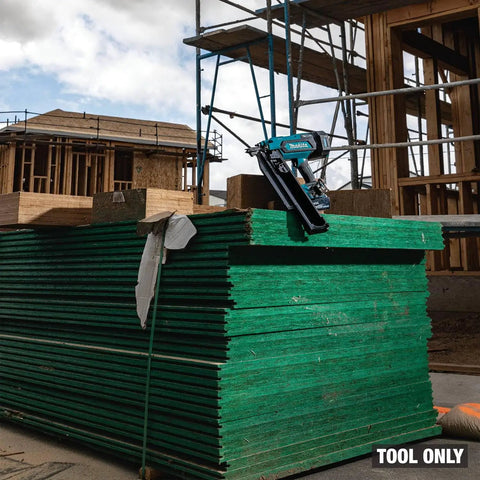 18V LXT Cordless Framing Nailer With 21 Degree Full Round Head, 3-1/2 Inch, tool only, on stack of plywood at construction site