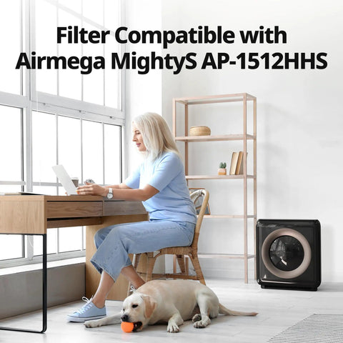 Woman working near Airmega AP-1512HHS air purifier, dog resting, filter compatible text on wall.