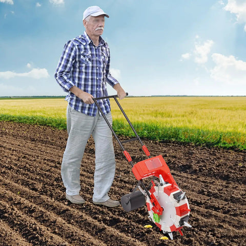 Man using Six Row Hand Push Garden Seeder With Precision Seed Metering And Adjustable Depth And Spacing in field