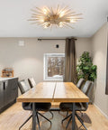 Gold Sputnik Ceiling Light Fixture 12 Light Firework Chandelier Semi Flush Mount For Bedroom Living Room Dining Room Modern Mid Century E12 29.5 Inch Diameter A Killer Statement Light installed in dining room.