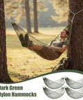 Man relaxing in a pine green mesh hammock tied between trees, part of the 4 Pack Mesh Hammocks Set For Outdoor Chill Pine Green Nylon Hammocks.