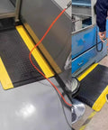 Industrial Anti Fatigue Mat 2 By 5 Feet Standing Floor Mat Fifteen Sixteenth Inch Thick Heavy Duty Commercial Diamond Plate Ergonomic Memory Foam Cushion in use on industrial floor.