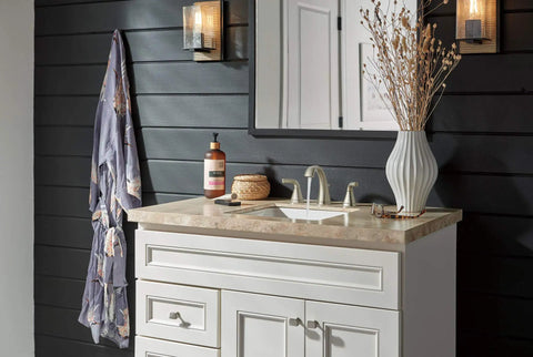 Bathroom with Parkwood No-Fuss Two-Handle Lavatory Faucet in brushed nickel on a white vanity, 3-hole, 6-16 inch installation.