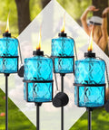 Four Pack Blue Glass Garden Torches 12 Oz Citronella Outdoor Lights with 60 Inch Adjustable Height for Patio Pathway Decor
