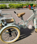 Outdoor Cruiser Tricycle For Travel And Fun Ride Ready Three Wheel Pedal Trike With Pneumatic Tires And Spoke Wheel Back Seat Tandem Style Adjustable Height Single Brake 20 Inch Light Green in parking area.