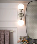 Bathroom with Colinet Traditional 24-Inch Towel Bar in Brushed Nickel, wall light fixtures, and mirror