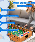 Adult playing on 2 In 1 Swivel Mini Game Table Top Wood Foosball And Slide Hockey Combo in living room setting.