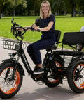 Foldable Fat Tire Electric Tricycle For Adults With 20x4.0 Fat Tires, 750W Motor, 48V 15Ah Removable Battery, Aluminum Frame, 3 Wheel Ebike, All Terrain Ready, 7 Speed, Built For Comfort On Sand Snow And City Streets, rider on park path