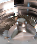 Close-up of stainless steel burrs inside Heavy Duty 64Mm Flat Burr Electric Coffee Grinder Designed For Single Dosing Habits.